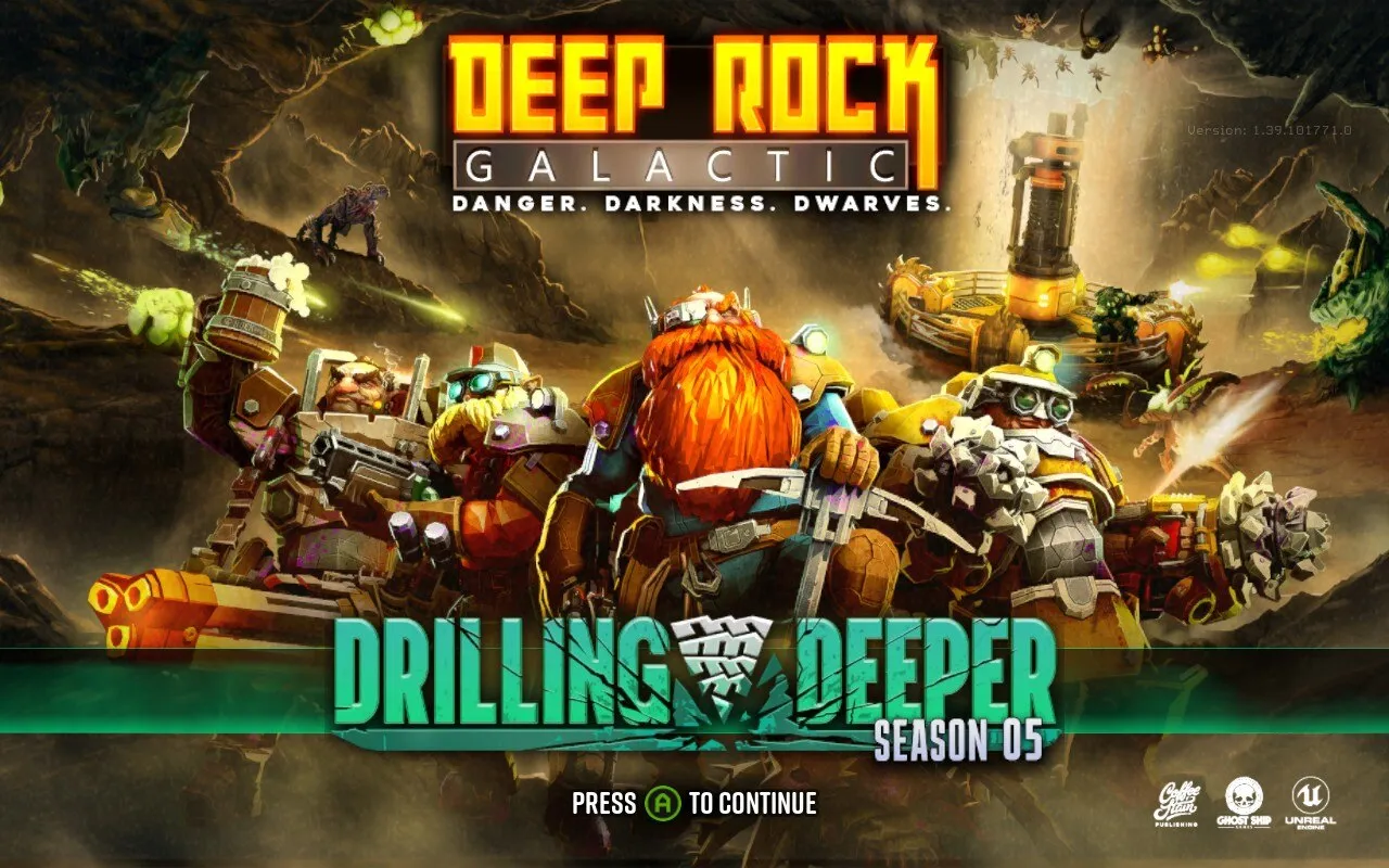 A group of heavily armored dwarves, equipped with various mining and combat gear, stand ready for action in an underground cave. Above them, the title DEEP ROCK GALACTIC is displayed in bold, yellow letters with the tagline DANGER. DARKNESS. DWARVES. underneath. Below the dwarves, the text DRILLING DEEPER SEASON 05 is prominently shown in teal, along with a prompt to PRESS A TO CONTINUE. The background features a mining environment with machinery, glowing minerals, and hostile creatures.
