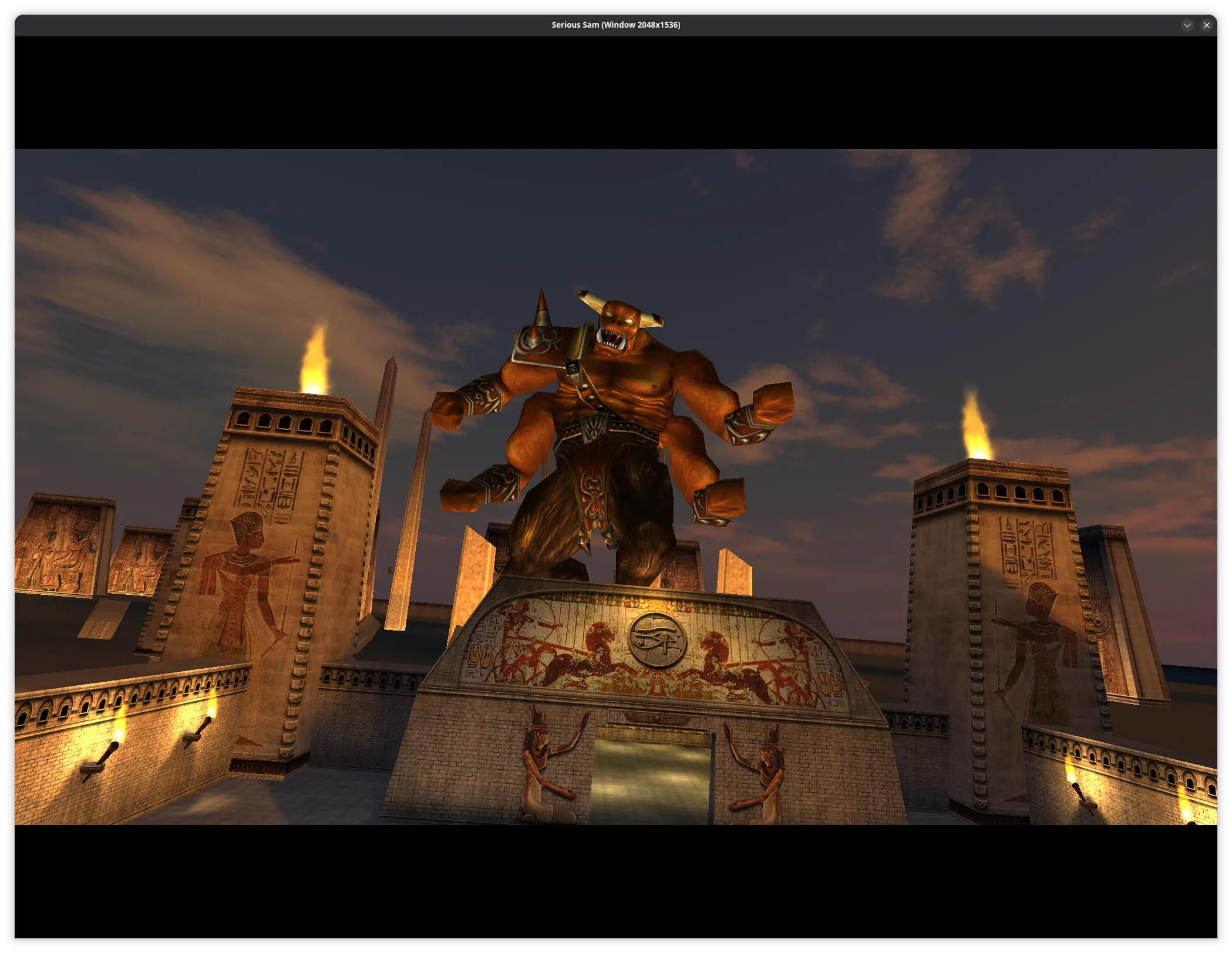 A towering, horned demon-like creature stands atop an ancient Egyptian-style temple at dusk, framed by stone pillars carved with hieroglyphs and lit by flaming braziers. The monster raises its arms in a threatening pose, looming over the monumental architecture beneath a darkening sky.