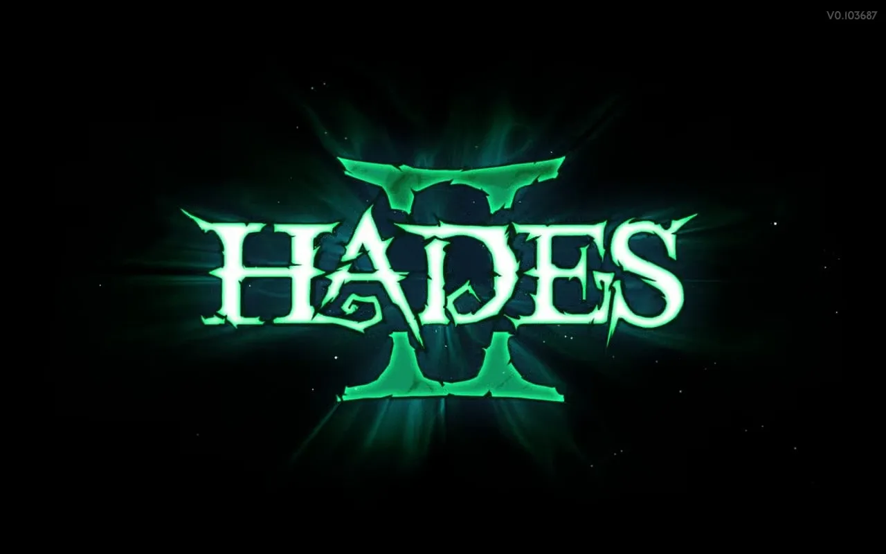 The title screen of the video game “Hades II” features the game’s name in a glowing green, jagged font against a dark background. The Roman numeral “II” is stylized with cracks and emits an eerie green light. Small particles of light float around the text. The version number “v0.103687” is displayed in the top right corner.