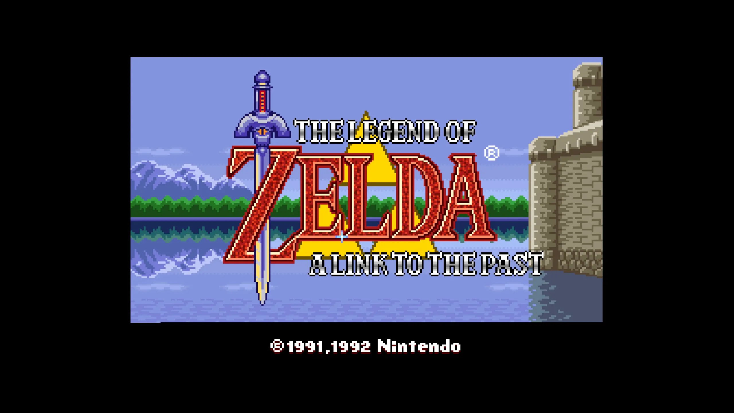 The opening credits to the Legend of Zelda. There is a brown castle off to the right side with a blue lake in the foreground. The background is of a green forest, blue mountain to the left, and a blue sky. The words The Legend of Zelda A Link To The Past appear over all of it. There is a sword going through the Z in Zelda and the gold triforce sits behind the title