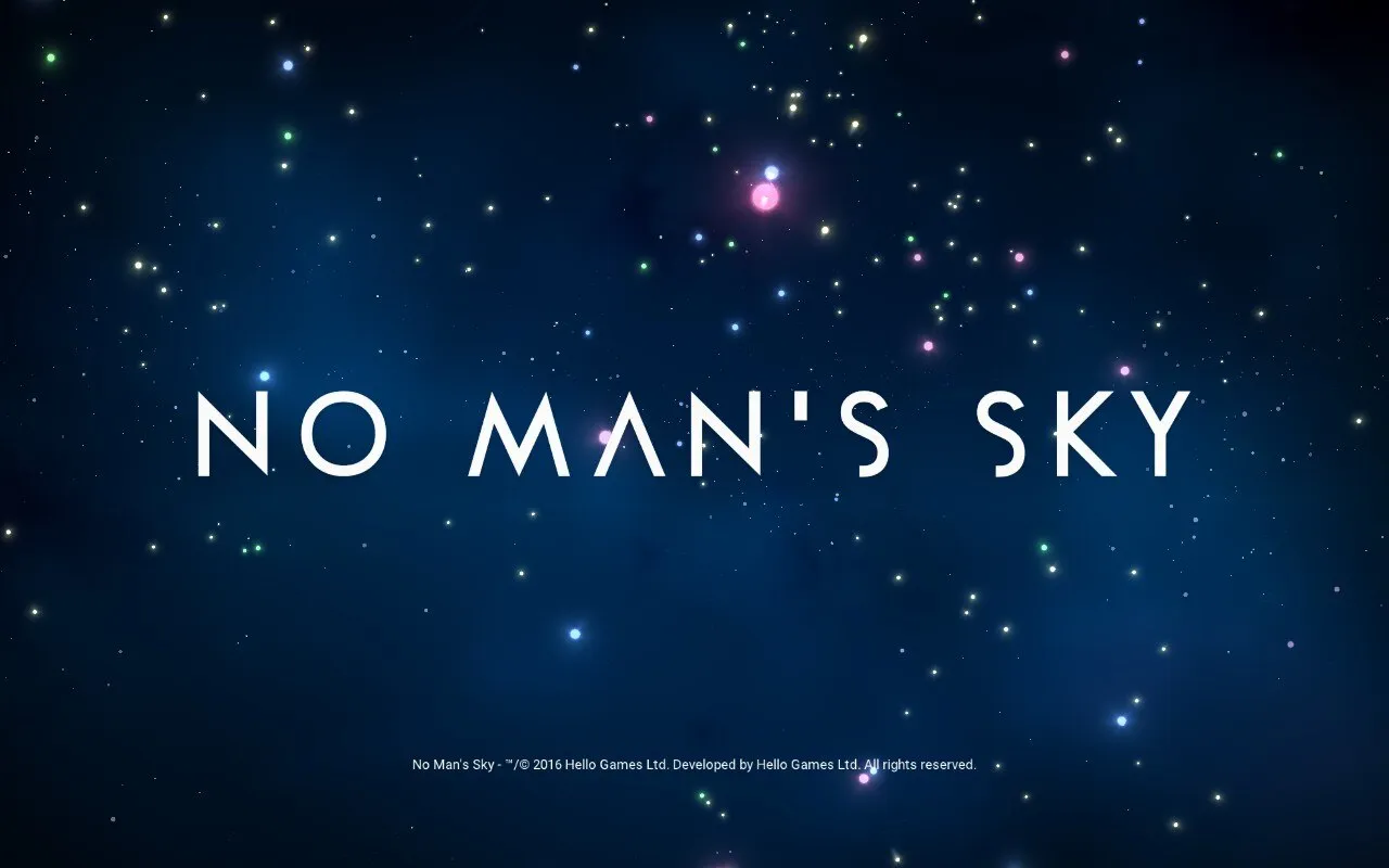 A starry night sky with the title ‘No Man’s Sky’ in large white letters centered in the image. The background is filled with numerous small, colorful stars scattered across a deep blue space. At the bottom, there is small text that reads ‘No Man’s Sky - © 2016 Hello Games Ltd. Developed by Hello Games Ltd. All rights reserved.’